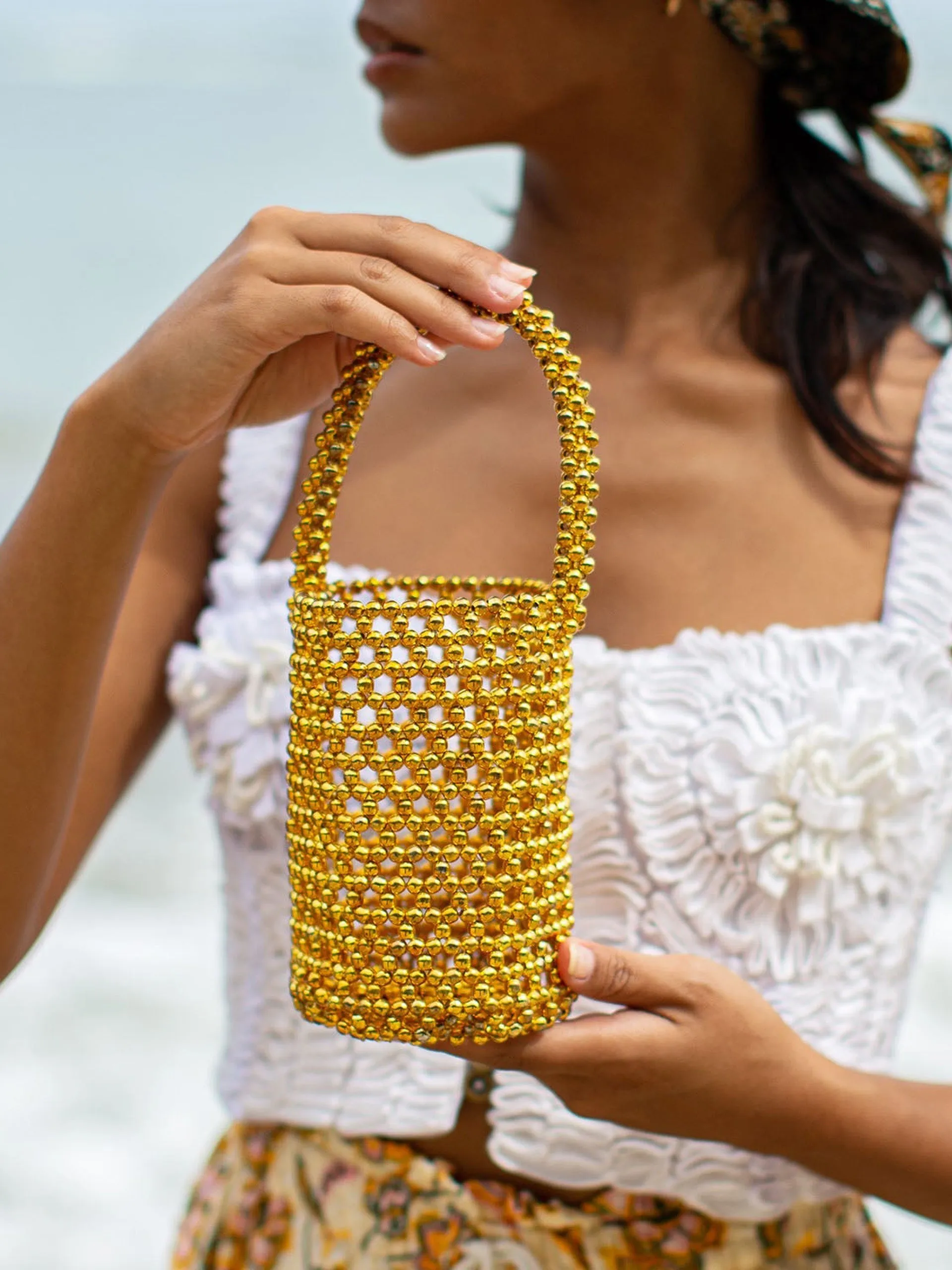 Golda metallic beads bucket bag in gold